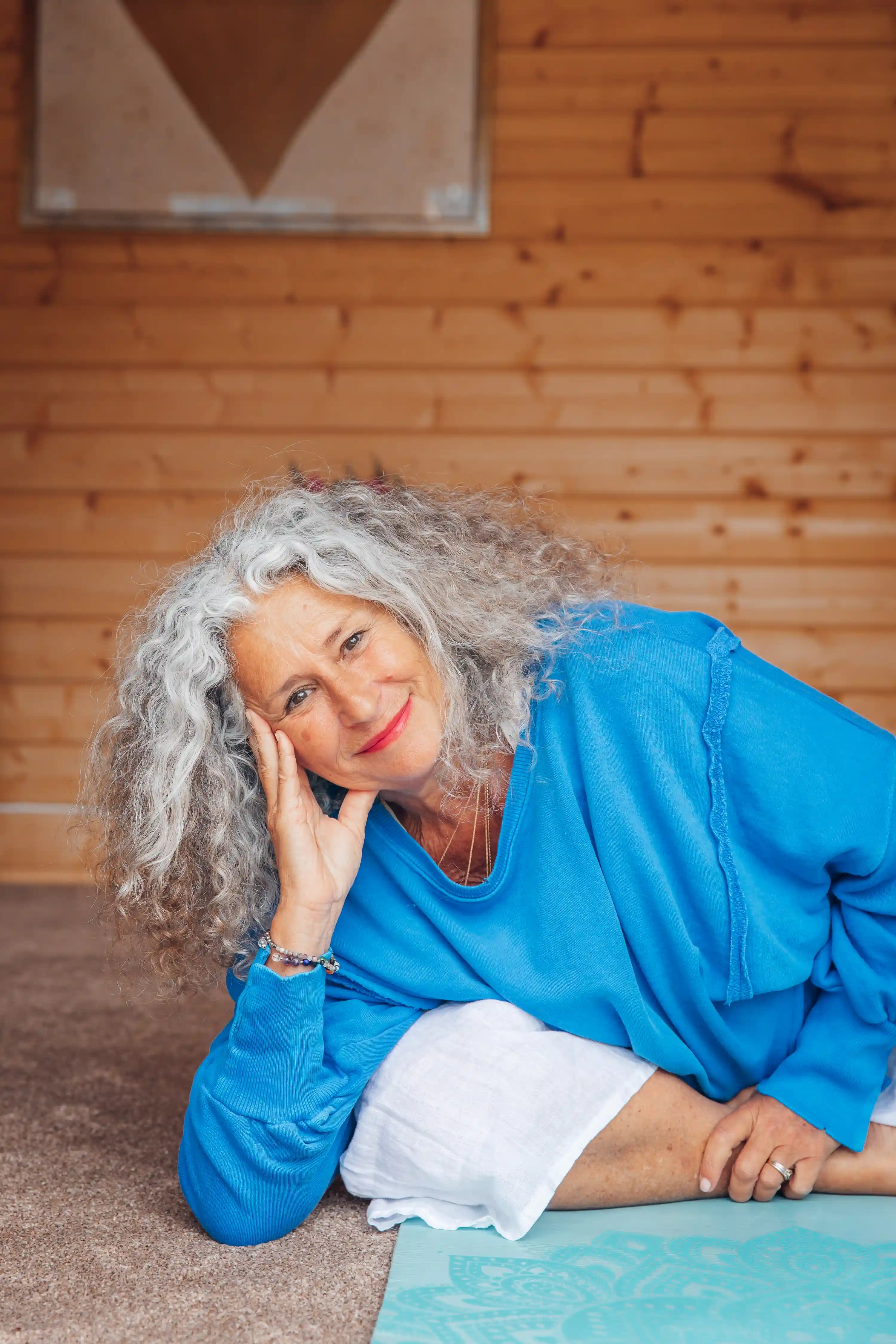 Image of Jyoti sat in her studio.